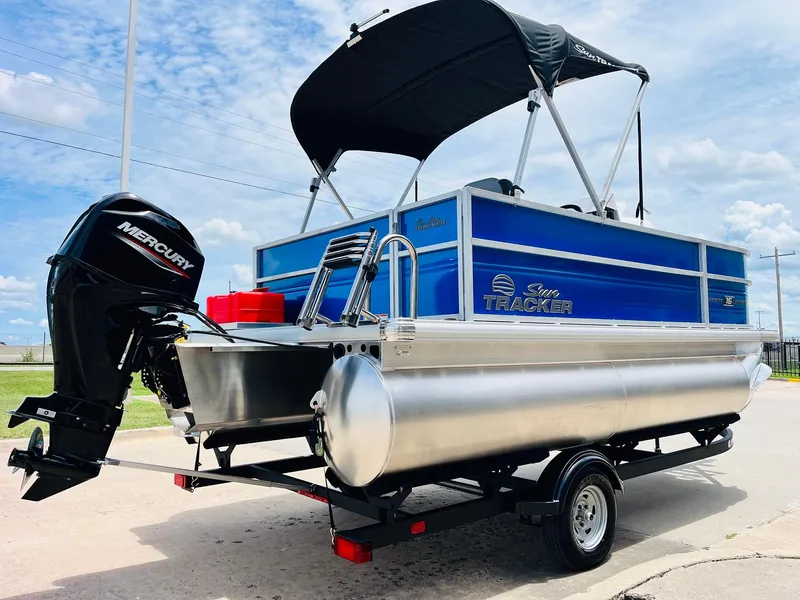 Slide: The Image of 2026 Sun Tracker Party Barge 16 DLX pontoon boat with Mercury outboard motor. - 6