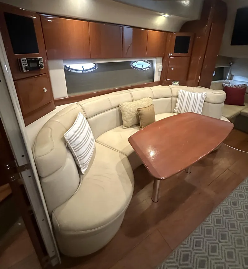 Slide: The Image of Luxurious interior of 2013 Formula 37 PC yacht with plush seating and wooden table. - 11