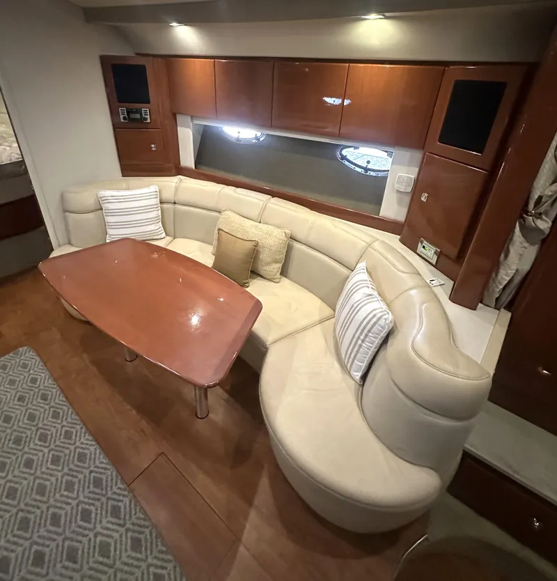 Slide: The Image of Luxurious interior of 2013 Formula 37 PC yacht with plush seating and wooden table. - 12