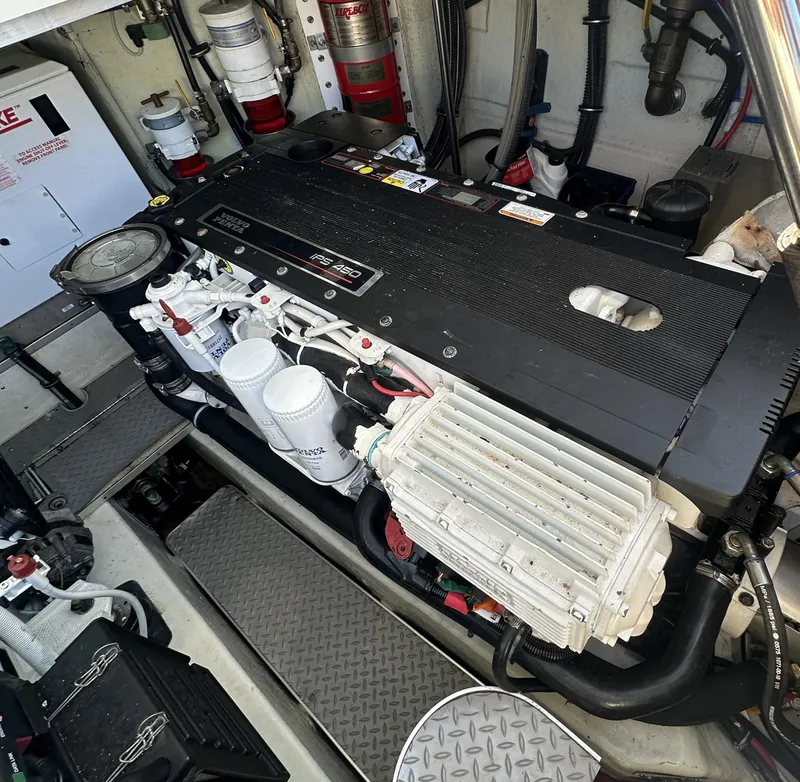 Slide: The Image of Engine compartment of a 2013 Formula 37 PC boat, showcasing detailed mechanical components. - 24