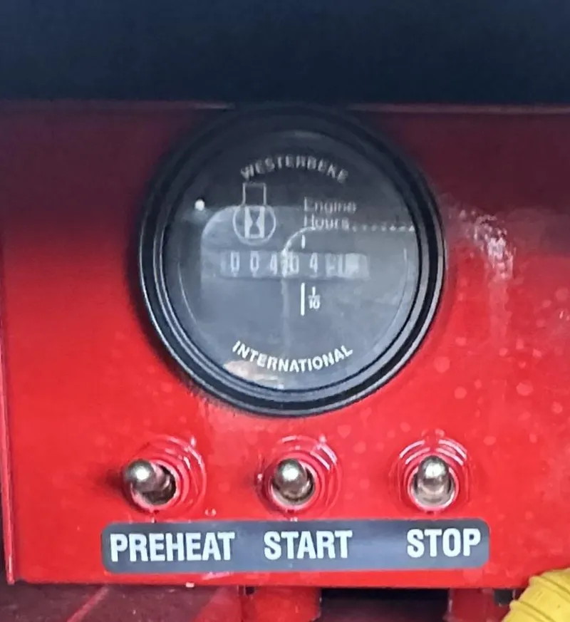 Slide: The Image of Engine hour meter with preheat, start, stop buttons on a 2013 Formula 37 PC. - 28