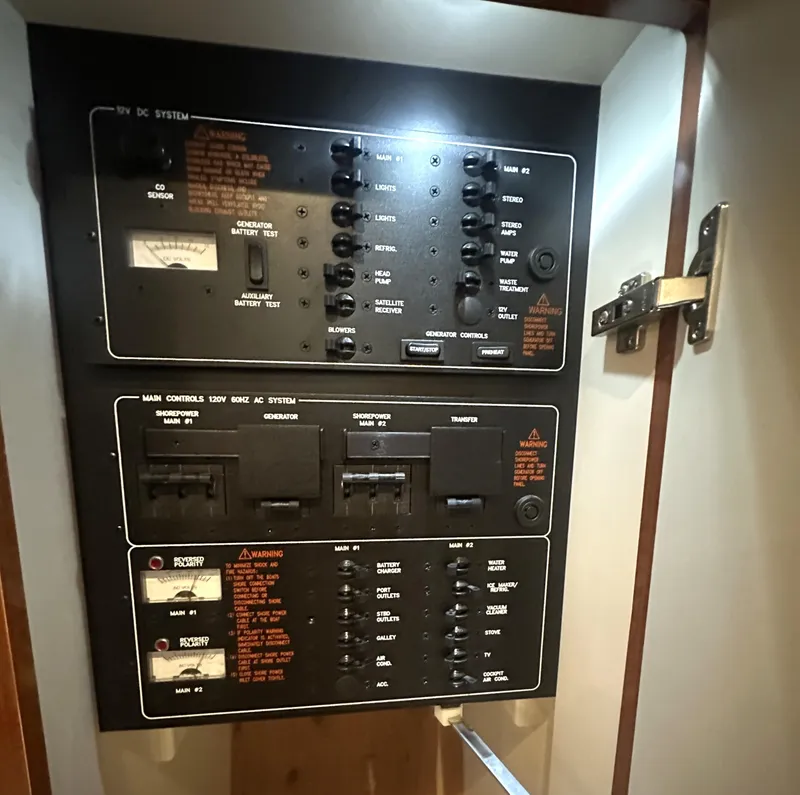 Slide: The Image of Electrical control panel inside a 2013 Formula 37 PC boat, featuring various switches and indicators. - 29