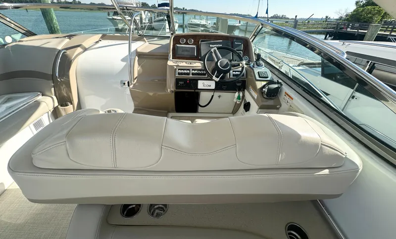 Slide: The Image of Cockpit of 2013 Formula 37 PC boat with steering wheel and navigation equipment. - 3