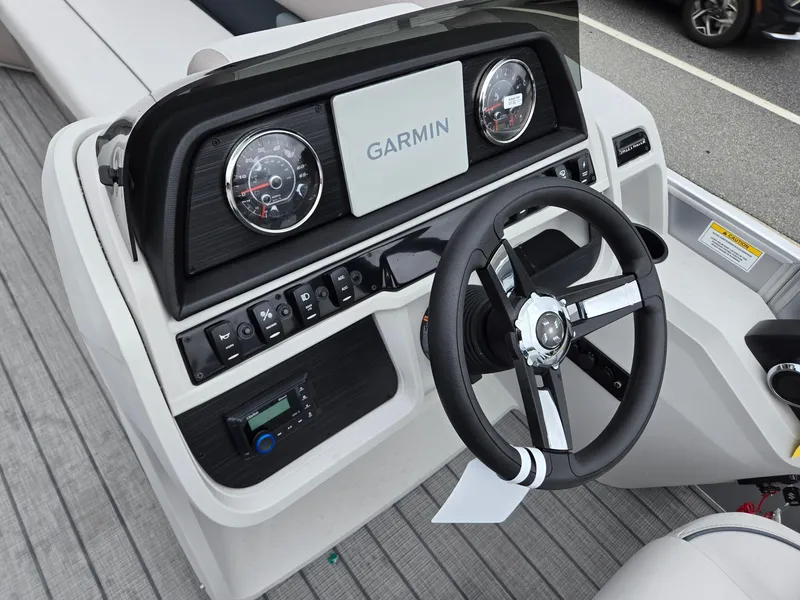 Slide: The Image of 2026 Godfrey SWEETWATER Entertainment 2486 DT boat dashboard with Garmin navigation system. - 14