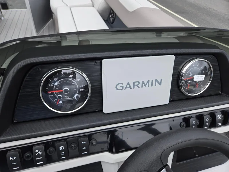 Slide: The Image of Dashboard of 2026 Godfrey SWEETWATER Entertainment 2486 DT with Garmin display and gauges. - 15