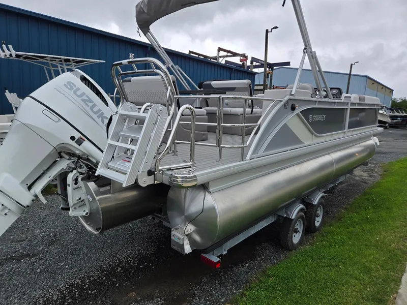 Slide: The Image of 2026 Godfrey SWEETWATER Entertainment 2486 DT pontoon boat with Suzuki outboard motor. - 2