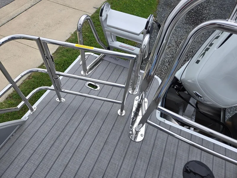 Slide: The Image of 2026 Godfrey SWEETWATER Entertainment 2486 DT boat deck with stainless steel railings. - 25