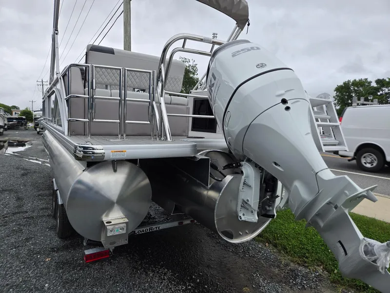 Slide: The Image of 2026 Godfrey SWEETWATER Entertainment 2486 DT pontoon boat with powerful outboard motor. - 3