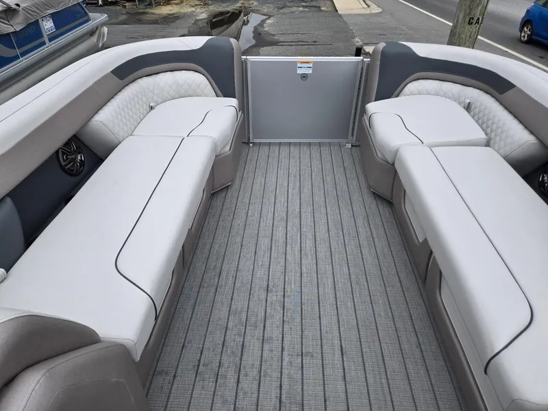 Slide: The Image of 2026 Godfrey SWEETWATER Entertainment 2486 DT boat interior with spacious seating and modern design. - 31