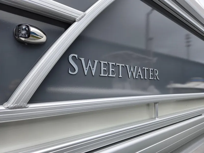 Slide: The Image of Close-up of 2026 Godfrey SWEETWATER Entertainment 2486 DT boat exterior. - 34