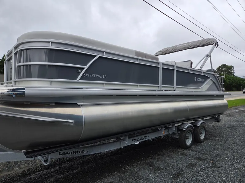 Slide: The Image of 2026 Godfrey SWEETWATER Entertainment 2486 DT pontoon boat on trailer, side view. - 5