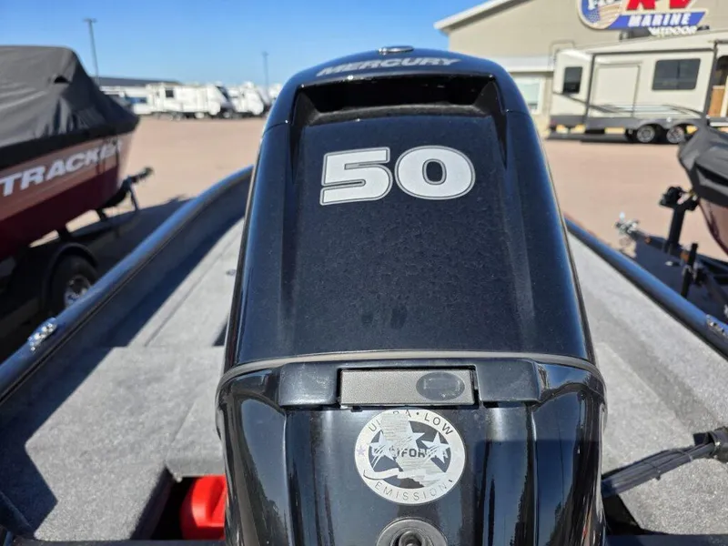 Slide: The Image of 2025 Tracker Super Guide V-16 SC with Mercury 50 horsepower outboard engine. - 2