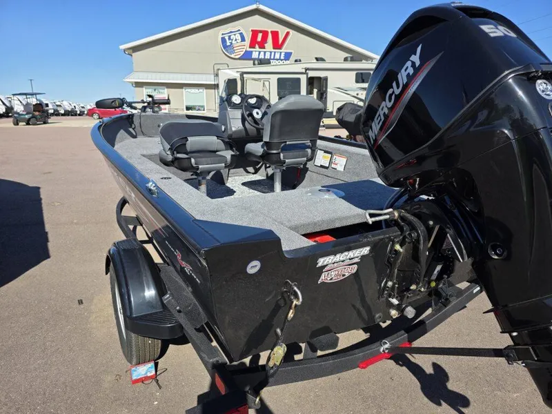 Slide: The Image of 2025 Tracker Super Guide V-16 SC boat with Mercury engine at RV Marine dealership. - 3