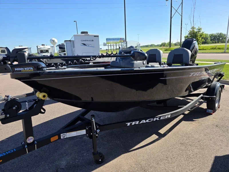 Slide: The Image of 2025 Tracker Super Guide V-16 SC boat on trailer, featuring Minn Kota PowerDrive motor. - 5