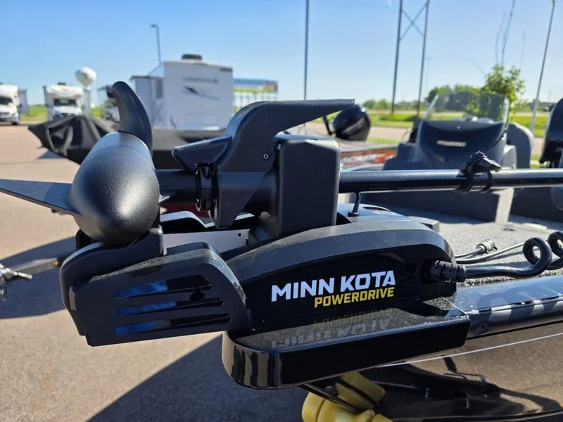 Slide: The Image of Minn Kota PowerDrive on 2025 Tracker Super Guide V-16 SC boat, parked outdoors. - 6
