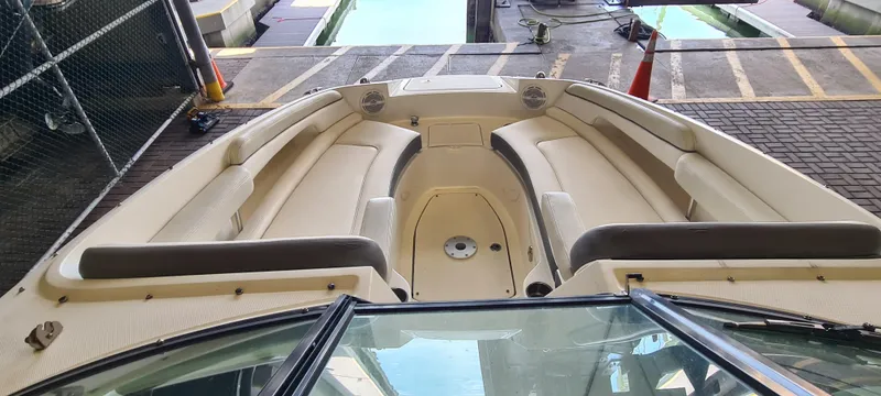 Slide: The Image of 2012 Sea Ray 260 Sundeck boat interior with spacious seating and sleek design. - 6