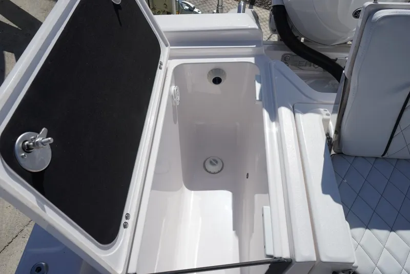 Slide: The Image of Open storage compartment on 2025 Sea Fox 282 Hybrid LT boat, featuring a sleek design. - 22