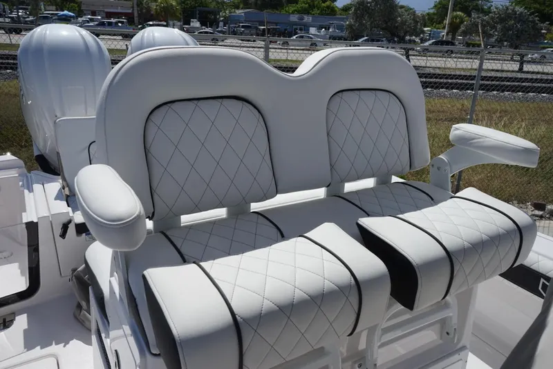 Slide: The Image of 2025 Sea Fox 282 Hybrid LT boat seats with diamond stitching and armrests. - 25