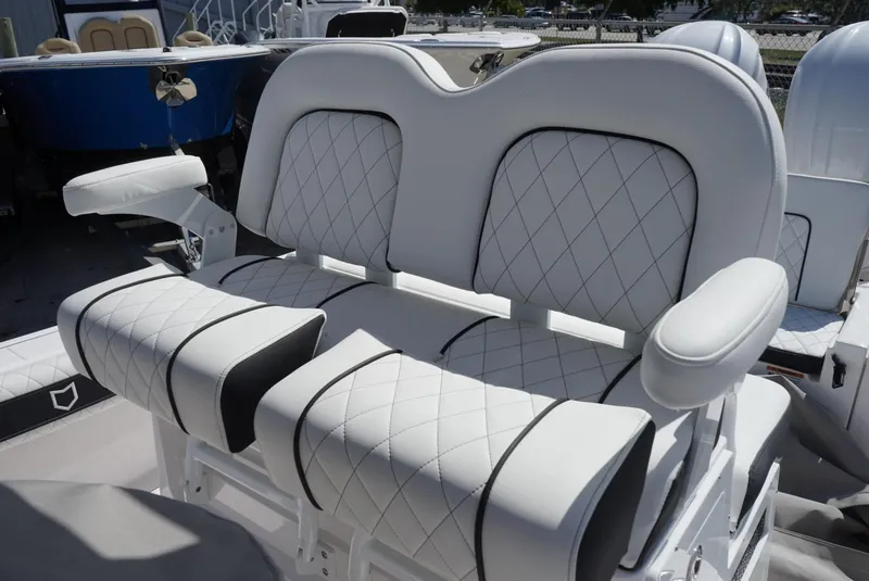 Slide: The Image of Luxurious seating on 2025 Sea Fox 282 Hybrid LT boat with diamond-stitched upholstery. - 26