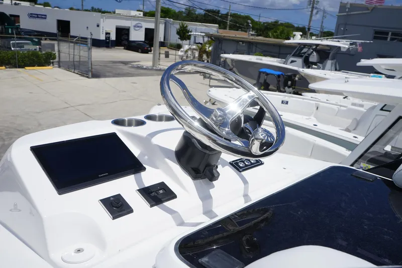 Slide: The Image of 2025 Sea Fox 282 Hybrid LT helm with modern controls and sleek design. - 4