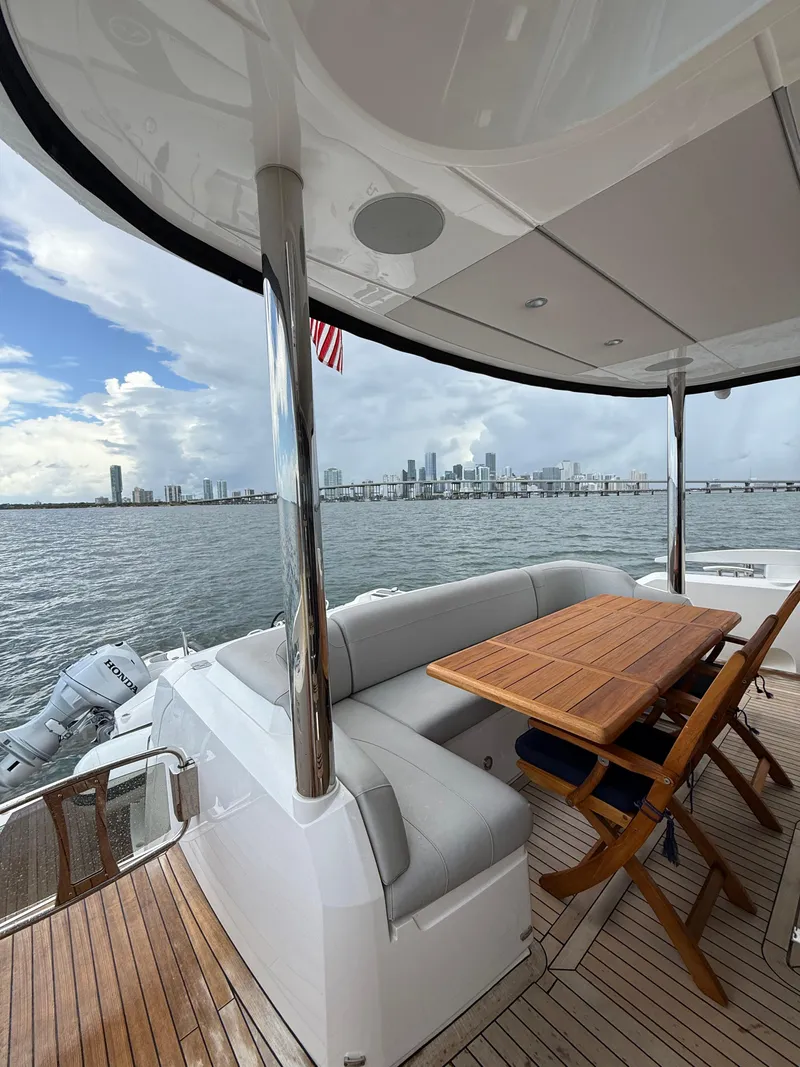 Slide: The Image of Luxurious Sunseeker Manhattan 68 yacht deck with city skyline view, 2022 model. - 14