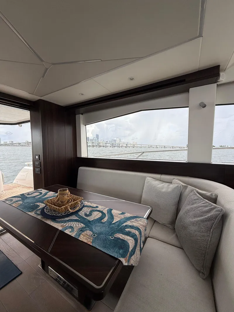 Slide: The Image of Luxurious interior of 2022 Sunseeker Manhattan 68 yacht with waterfront view. - 35