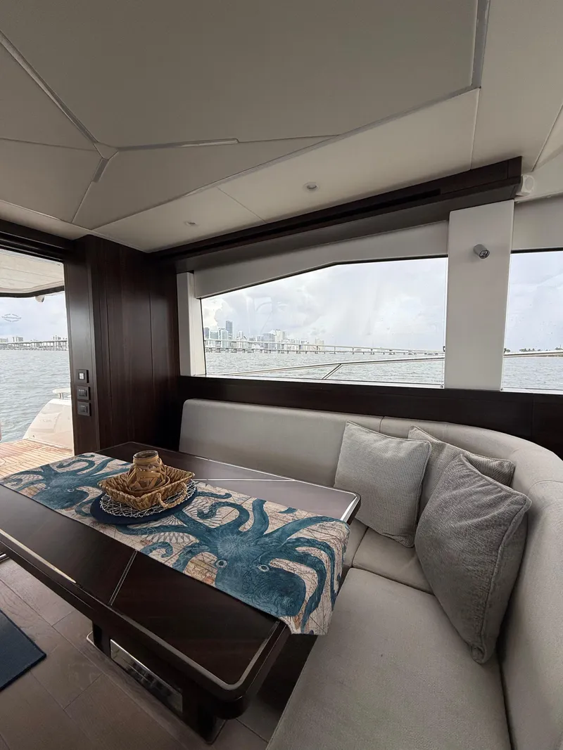 Slide: The Image of Luxurious interior of 2022 Sunseeker Manhattan 68 yacht with ocean view. - 36