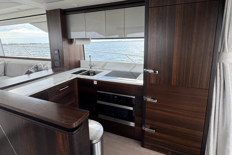Slide: The Image of Luxurious kitchen interior of 2022 Sunseeker Manhattan 68 yacht with ocean view. - 44