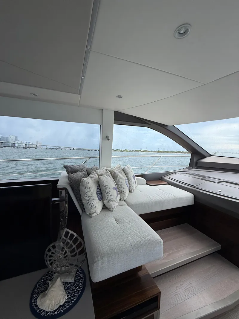 Slide: The Image of Luxurious interior of 2022 Sunseeker Manhattan 68 yacht with elegant seating and ocean view. - 45