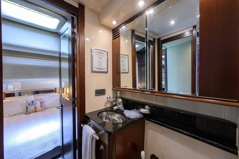 Slide: The Image of Luxurious bathroom and bedroom interior of 2005 Sea Ray 52 Sedan Bridge yacht. - 13