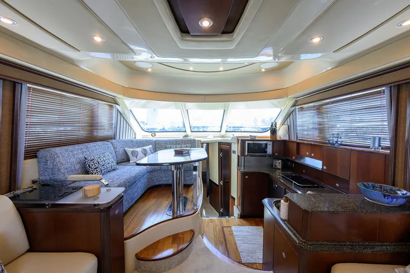 Slide: The Image of Luxurious interior of a 2005 Sea Ray 52 Sedan Bridge yacht with modern amenities. - 4