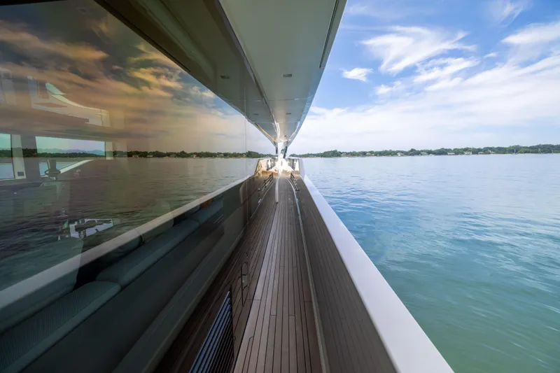 Slide: The Image of Sanlorenzo SL90A 2024 yacht deck with ocean view and sleek design. - 15