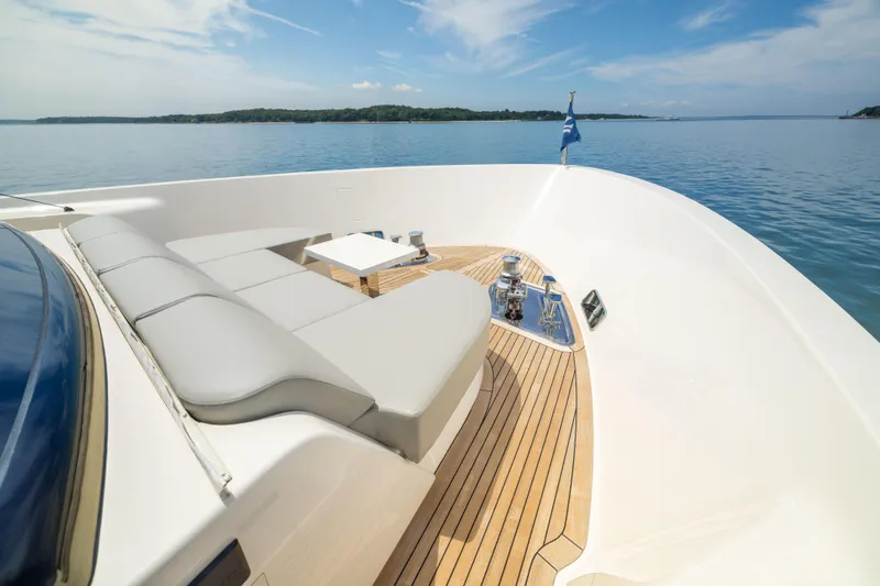 Slide: The Image of Luxurious 2024 Sanlorenzo SL90A yacht deck with sleek seating and ocean view. - 16