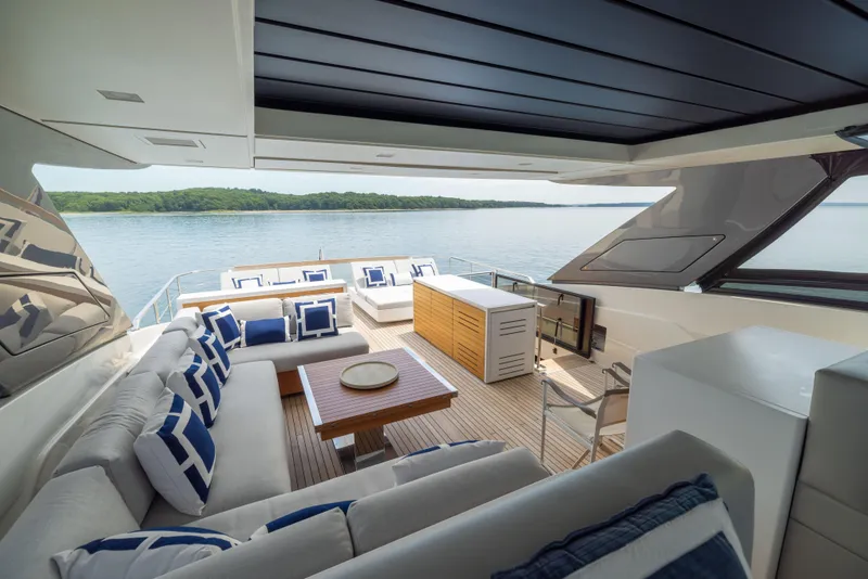 Slide: The Image of Luxurious 2024 Sanlorenzo SL90A yacht interior with elegant seating and scenic ocean view. - 24
