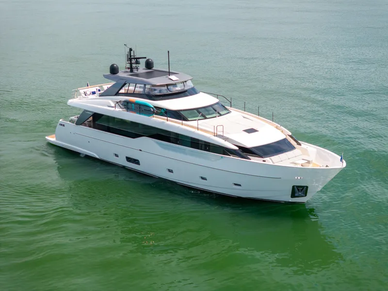 Slide: The Image of 2024 Sanlorenzo SL90A luxury yacht cruising on calm green waters. - 3