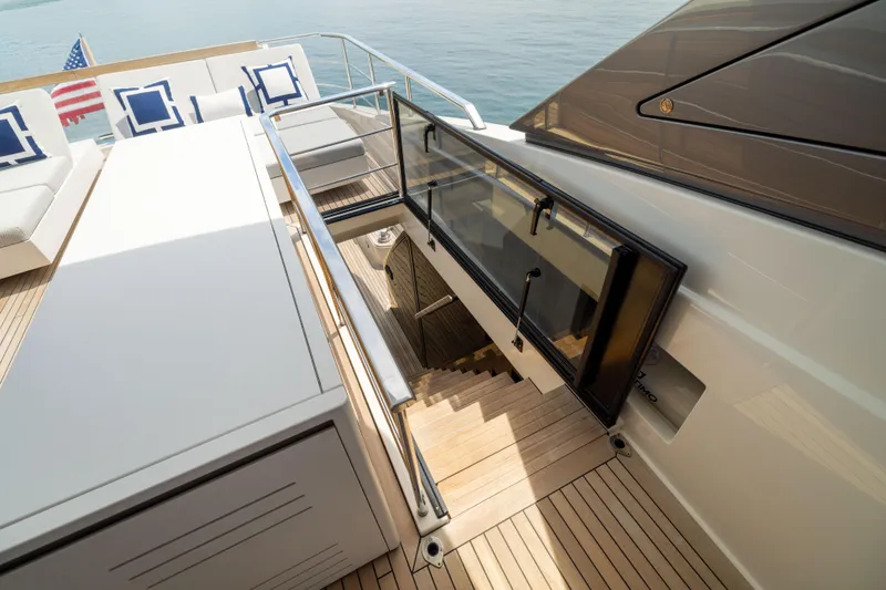 Slide: The Image of Luxurious 2024 Sanlorenzo SL90A yacht deck with elegant seating and staircase. - 38