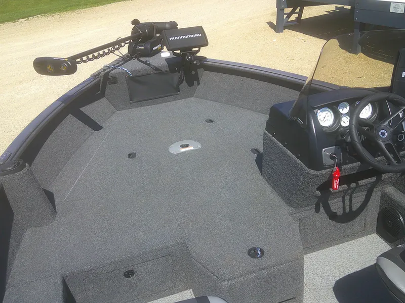 Slide: The Image of 2020 Lund 1875 Impact SS boat interior with Humminbird electronics and steering console. - 4