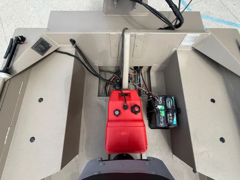 Slide: The Image of 2018 Alweld 1752 Marsh Series boat interior with red fuel tank and battery. - 13