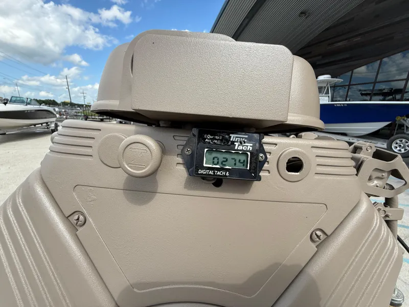 Slide: The Image of Digital tachometer on 2018 Alweld 1752 Marsh Series boat engine, outdoor setting. - 14