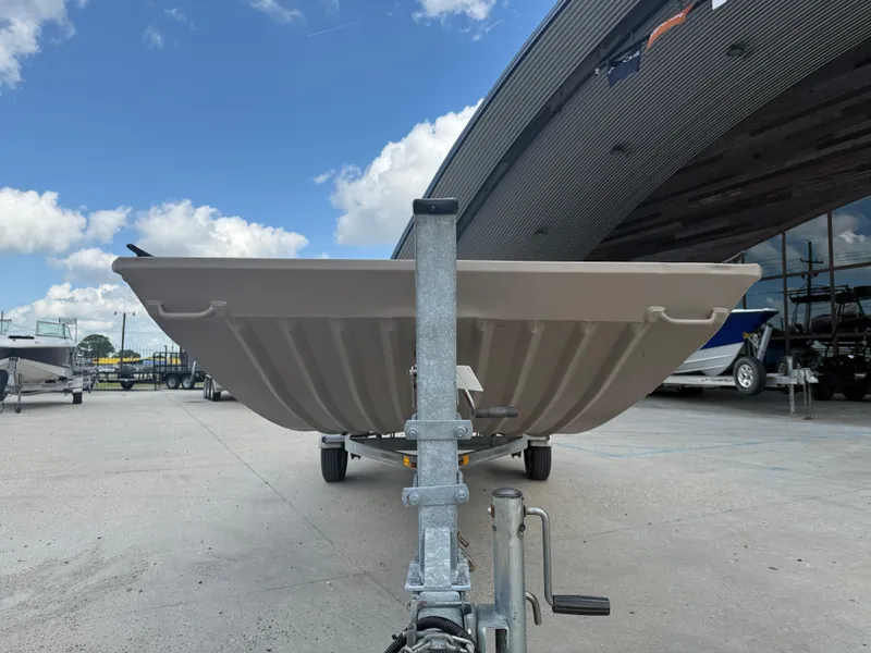 Slide: The Image of 2018 Alweld 1752 Marsh Series boat on trailer, parked outdoors under blue sky. - 3