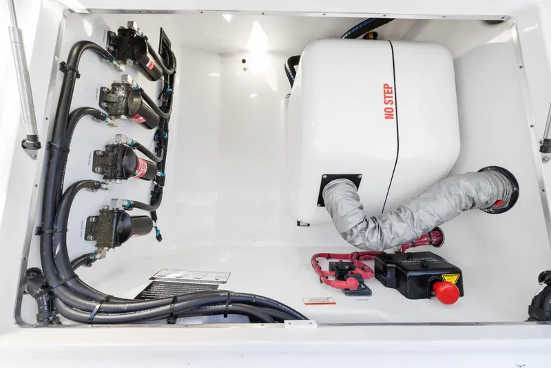 Slide: The Image of 2023 Cigarette 42 Auroris engine compartment with wiring and components. - 35