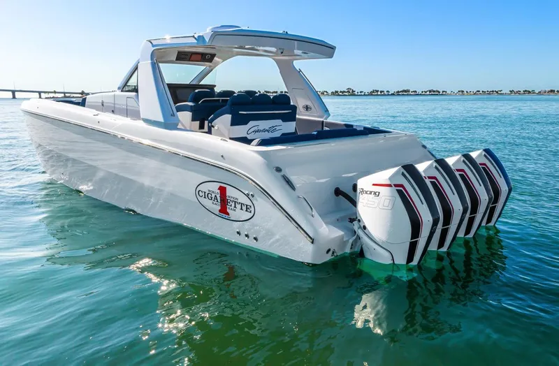 Slide: The Image of 2023 Cigarette 42 Auroris boat with quad engines on calm water. - 4