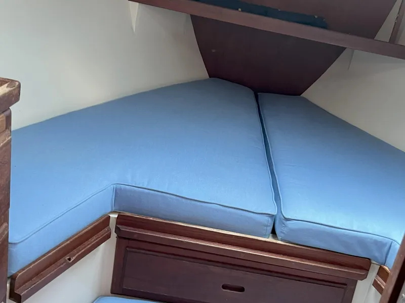 Slide: The Image of V-berth cabin with blue cushions in 1989 Catalina 34 MkII sailboat. - 13