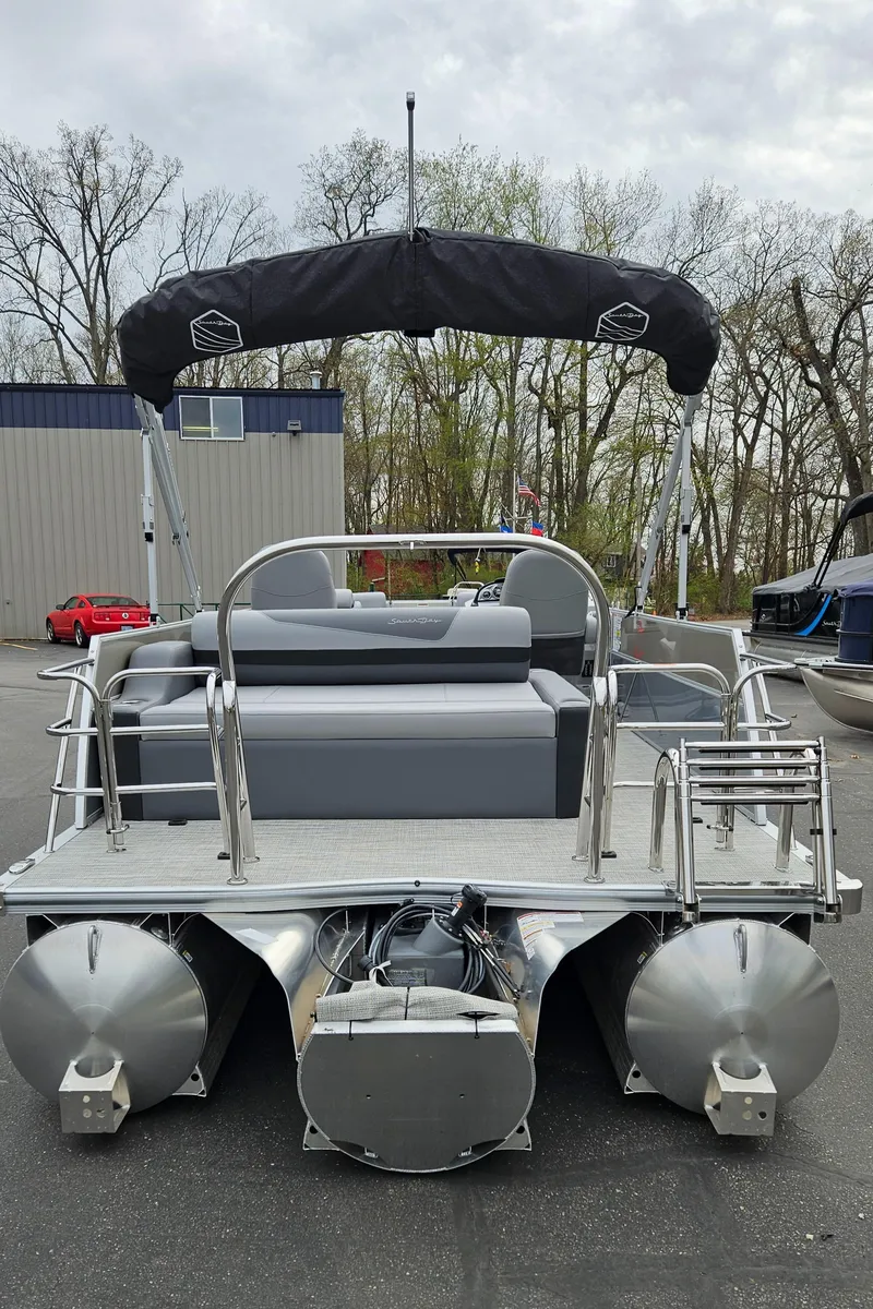 Slide: The Image of 2023 South Bay S224 UL TRIPLE pontoon boat, rear view with canopy. - 7