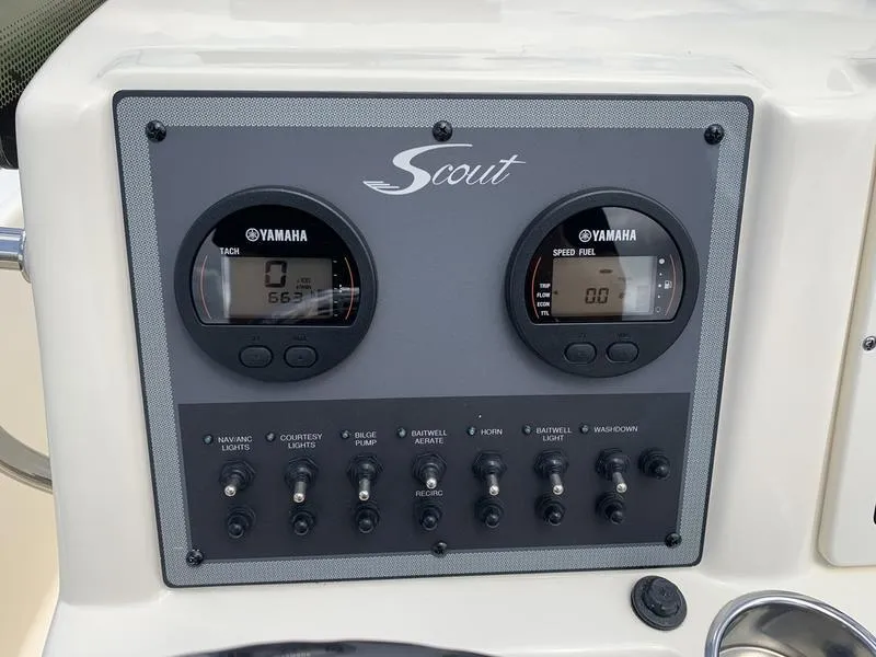 Slide: The Image of Control panel of 2019 Scout 175 Sportfish boat with Yamaha gauges and switches. - 13