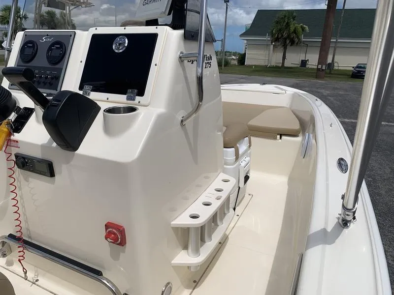 Slide: The Image of 2019 Scout 175 Sportfish boat interior with console and seating area. - 16