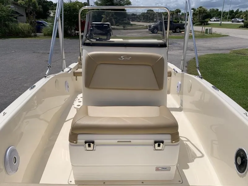 Slide: The Image of 2019 Scout 175 Sportfish boat interior with beige seating and console. - 21