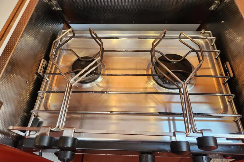 Slide: The Image of Two-burner stove in a 2007 Hallberg-Rassy 37 yacht kitchen. - 34