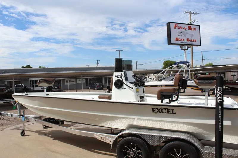 Slide: The Image of 2026 Excel Bay Pro Elite 230 boat at Fun-N-Sun Boat Sales dealership. - 4