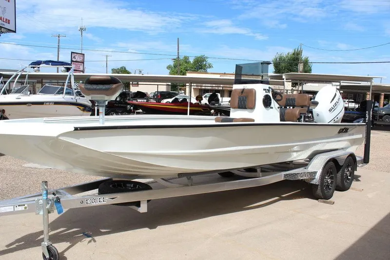 Slide: The Image of 2026 Excel Bay Pro Elite 230 boat on trailer, outdoor dealership display. - 6
